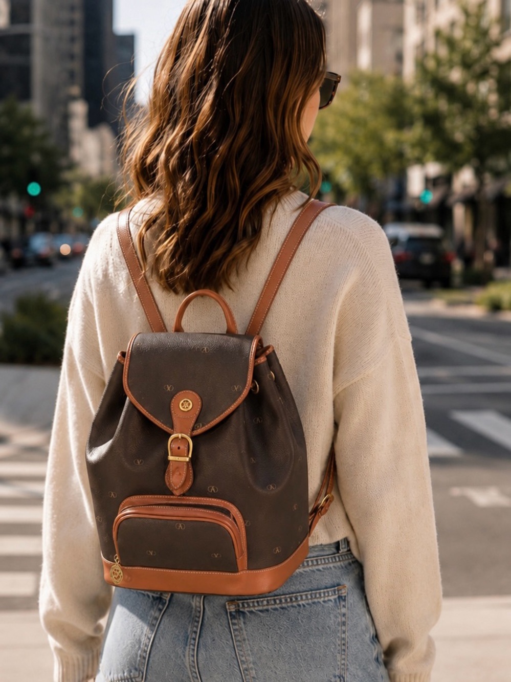 Valentino Garavani Monogram Leather Drawstring Backpack. Comes with COA